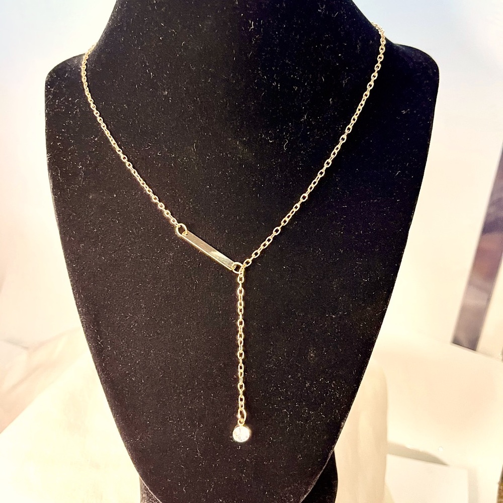 Gold and rhinestone asymmetric necklace
